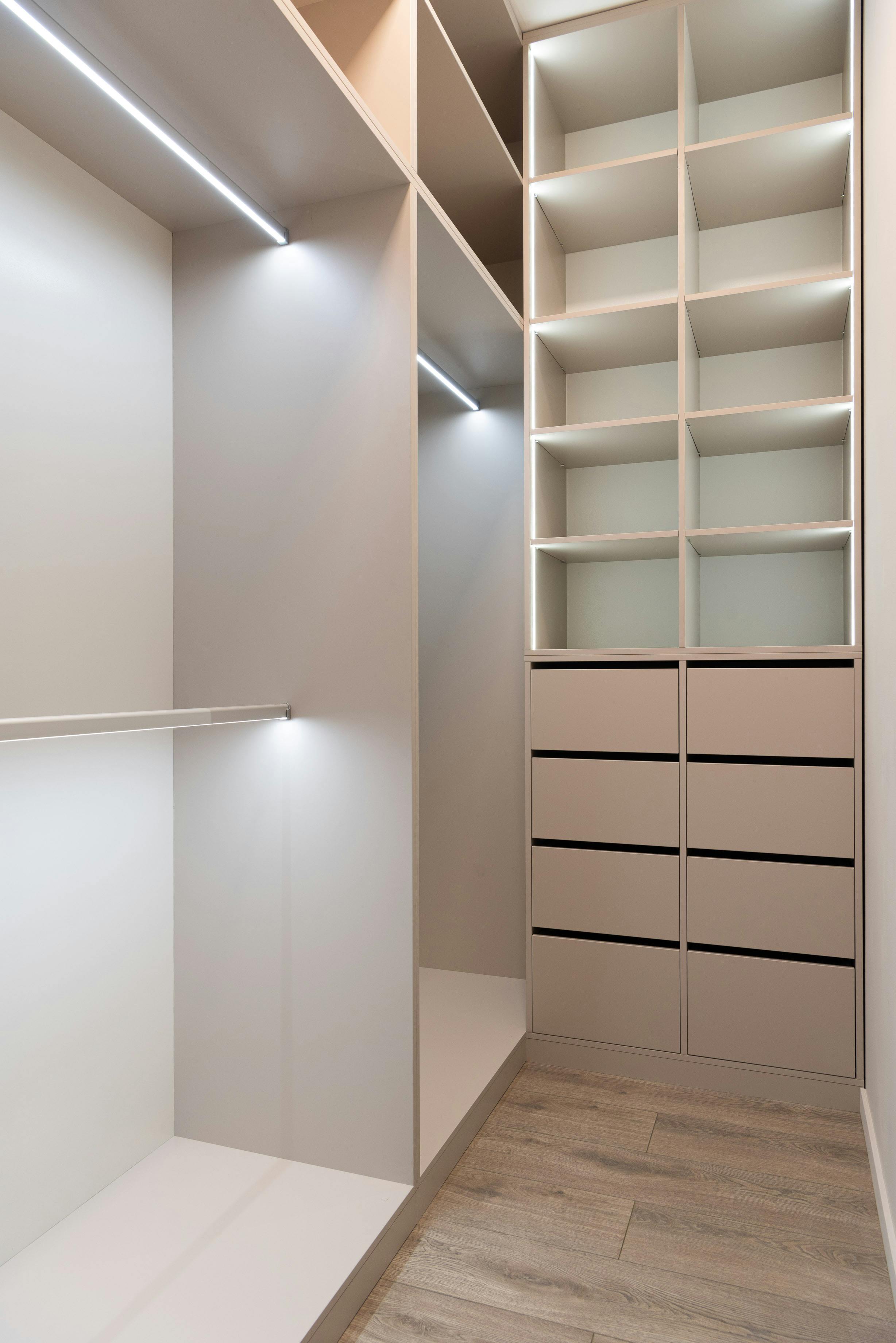 Walk-in closet with island dresser