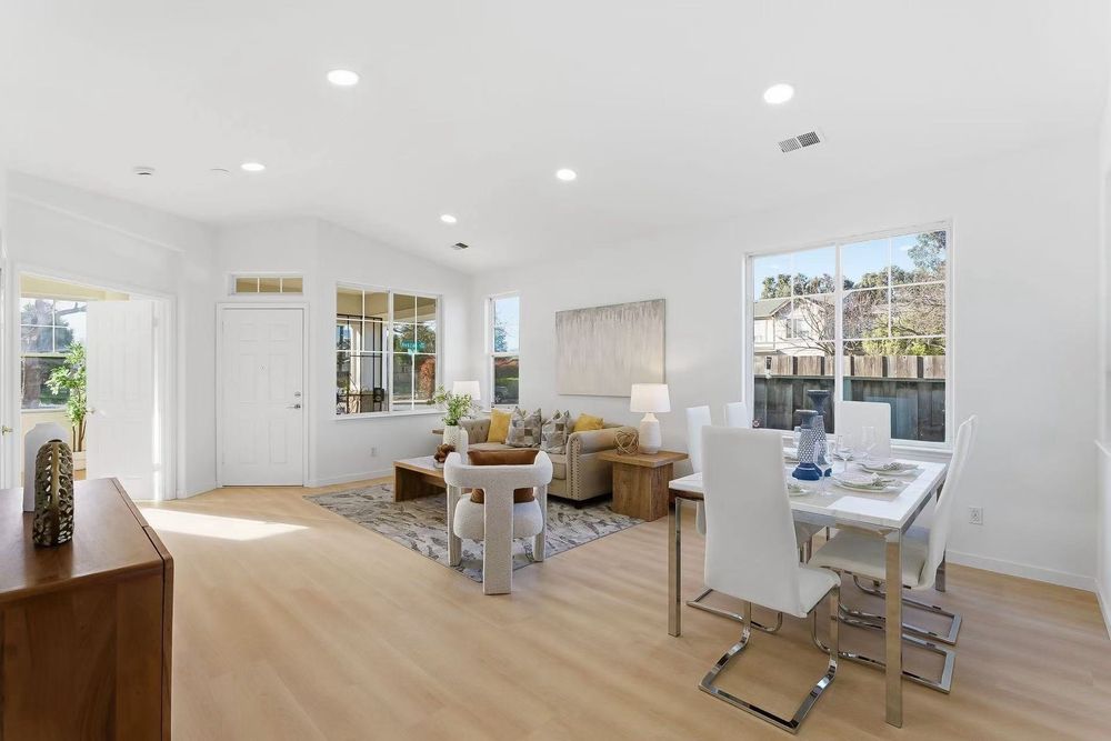 Open living & dining with hardwood — Armonia project